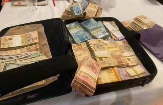 Operação Alto Escalão apreende mala de dinheiro na casa de investigados — Foto: Arquivo pessoal